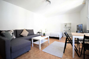 Excellent studio - best location, big rooftopterrace